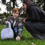 Sequim Gazette photo by Matthew Nash/ Artem Cummings, 5, searches for eggs with his sister Alivia Cummings, 12, during the Sequim Elks annual Easter egg hunt. The siblings said they come to the event every year.