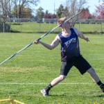 Sequim Gazette photo by Emily Mathiessen/ Gavin Albers makes a throw in a home meet on April 17.