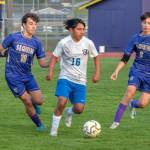 Sequim Gazette photos by Emily Mathiessen
Sequims Nico Musso (19) and Sebastian Buhrer (6) surround Bremertons Luis Funez Ramos (16) in the Wolves 3-1 victory over Bremerton in Sequim on Friday.