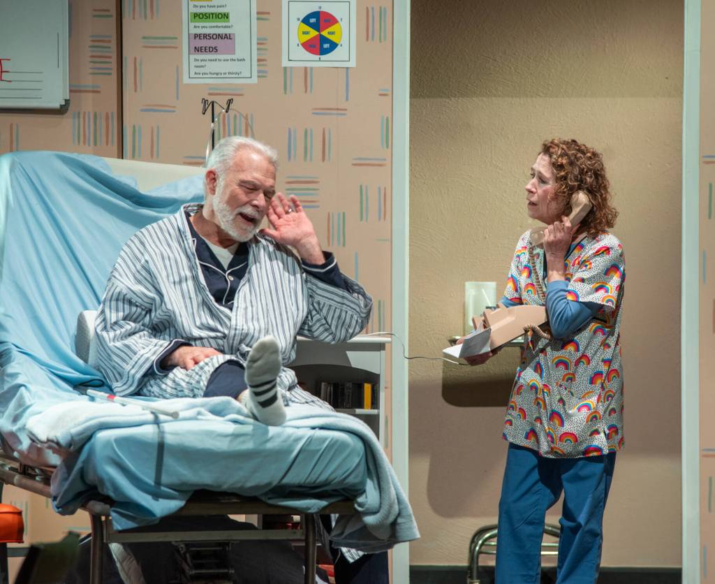 Sequim Gazette photo by Emily Matthiessen/ Vince Campbell and Marilyn Snook rehearse a scene in Wrong Turn at Lungfish, running at Olympic Theatre Arts Center April 25-May 11.
