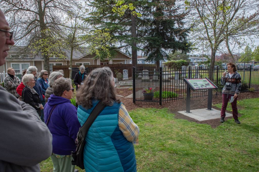 Sequim Gazette photo by Emily Matthiessen/ Susan Mannisto with the Sequim Prairie Garden Club speaks on April 19 at the dedication of Pioneer Memorial Parks Memorial Garden.