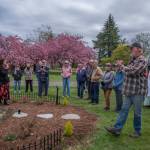 Sequim Gazette photo by Emily Matthiessen/ Joe LaCour explains to an audience of pioneer descendants, Sequim Prairie Garden Club members and others how he made the new sundial for Pioneer Memorial Park, which was dedicated during a ceremony on Saturday, April 19. The garden club also dedicated the refurbished Remembrance Garden.