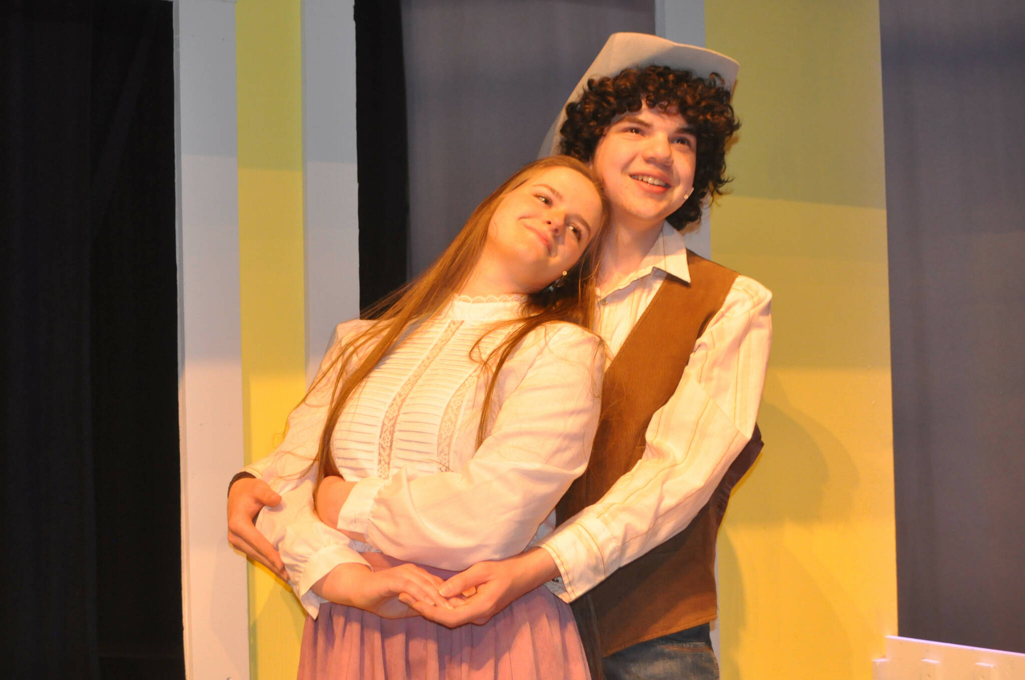 Sequim Gazette photo by Matthew Nash
Laurey and Curly (Jovi Weller and Boden Cowgill) share a romantic moment during a scene in Oklahoma! The show was last seen at Sequim High School for its 2000 operetta.