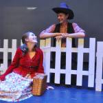 Sequim Gazette photo by Matthew Nash/ Emma Gilliam and Aason Judd, portraying Ado Annie Carnes and Will Parker, swoon for each other during a scene in Oklahoma! The show runs two weeks at Sequim High School.