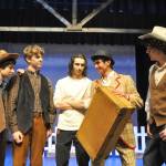 Sequim Gazette photo by Matthew Nash/ Actors from left, Charlie Medlong, Hayden Rayburn, Colin McKenzie, Reid Randall and Boden Cowgill rehearse a scene from Oklahoma! Where Randalls peddler character Ali Hakim arrives.