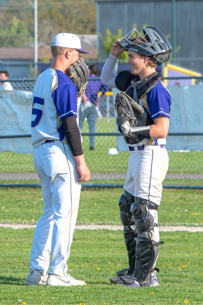 Sequim Gazette photo by Emily Matthiessen/ Pitcher Hunter Tennell and catcher Zeke Schmadeke have a chat during the game on April 24 against Cedar Park Christian. Tennell has an RBI and Schmadeke a hit and run in the 5-4 loss.