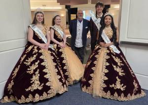 Photo by Beth Pratt| Sequim Irrigation Festival Royalty - from left, Queen Lily Tjemsland, Princess Roxy Woods, Prince Malachi Byrne and Princess Joanna Morales - served as greeters at the April Sequim-Dungeness Valley Chamber of Commerce luncheon. Pictured with the royal court is Jim Stoffer, president of the Shiso Sister City organization, who was the luncheons speaker.