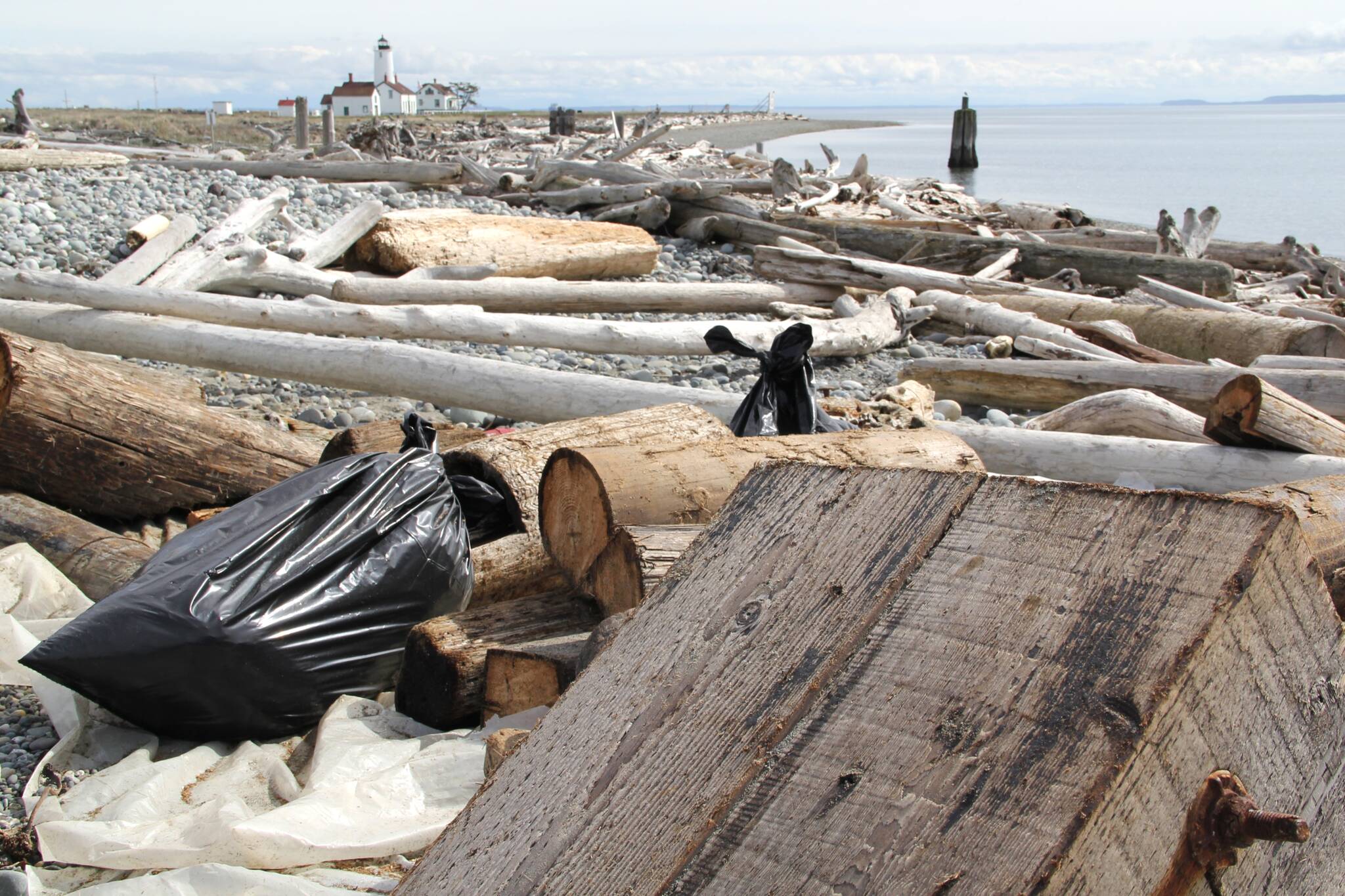 Photo courtesy Washington Department of Natural Resources/ From March 31-April 10, state and tribal crews removed 19,290 pounds of toxic wood and other large marine debris from the Dungeness Spit.