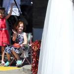 Sequim Gazette file photo by Matthew Nash
Friends Yana White, left, and Isla Daines wave to a royalty float as it goes down West Washington Street for the Sequim Irrigation Festivals Grand Parade in 2024. It was Yanas second time at the parade, while Isla has gone since she was a baby, their moms said at the time. This years Grand Parade is set to start at noon, Saturday, May 10.