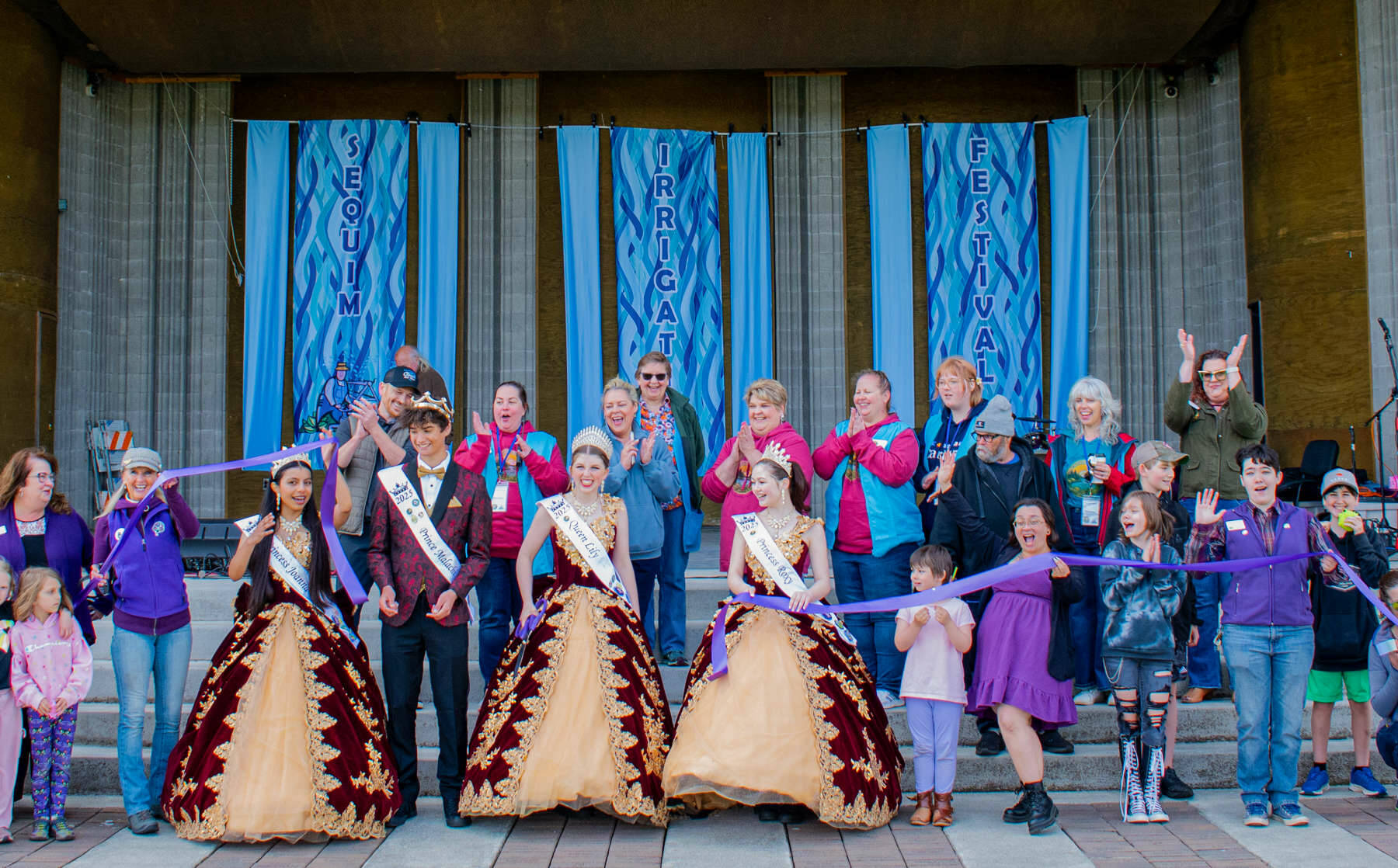 Photo by Time Catcher Photography| The first weekend of the Sequim Irrigation Festival kicked off with a ribbon-cutting with help from the chamber and Irrigation Festival royalty.