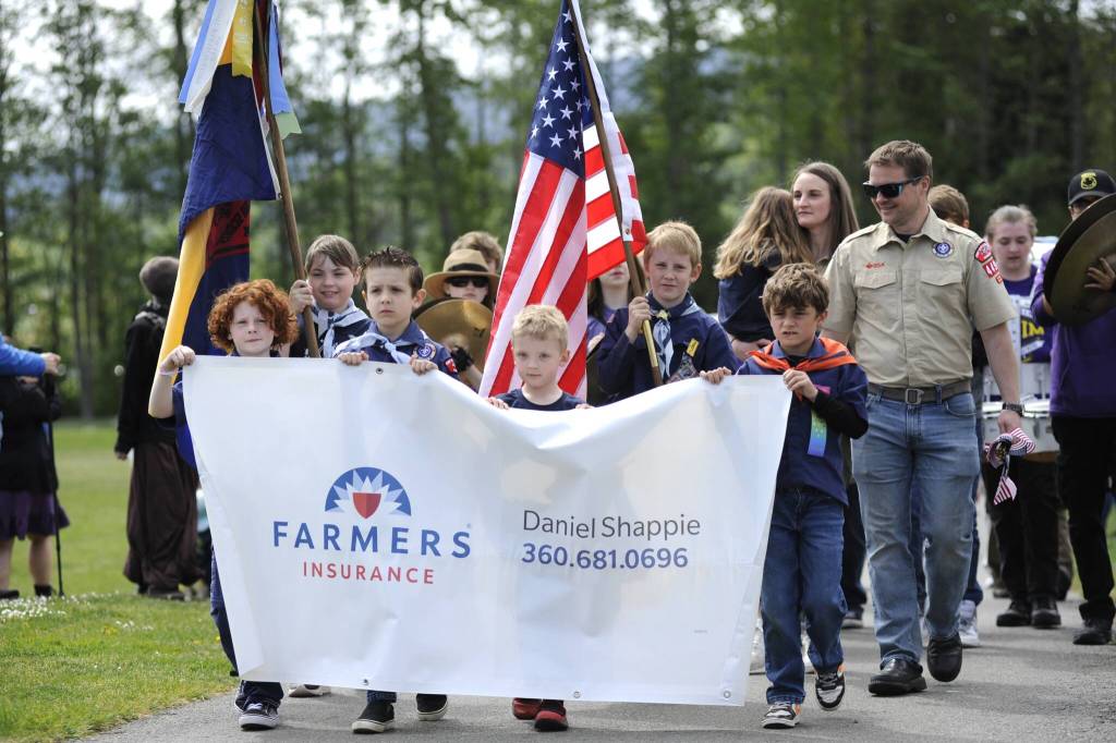 Sequim Gazette photo by Matthew Nash/ Sequim Cub Scout pack 4490 leads the Kids Parade once again, a tradition theyve had for several years.
