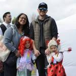 Sequim Gazette photo by Matthew Nash/ The Shappie family, mom Litia, dad Dan, 5-year-old Samara as Ariel the mermaid, and 3-year-old Sienna as a ladybug, ready for the Kids Parade on May 3. Dan co-chairs the Classic Car Show, and the parents said theyve participated in the Kids Parade for the last five years.