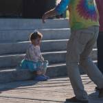 Sequim Gazette photo by Emily Matthiessen
 The adults dance to Black Diamond Junction on Saturday evening, while three-year-old Ember Johnson has a contemplative moment.