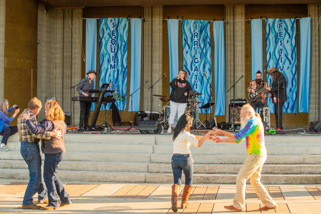 Sequim Gazette photo by Emily Matthiessen/ Black Diamond Junction played Sat. evening at the family dance in Carrie Blake Park.