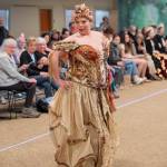 Sequim Gazette photo by Emily Matthiessen/ Trashion Show participant Aja Alexander won Best in Show for her dress, which she also modeled. The dress was named Fragments, symbolizing Alexander rebuilding her life, and is composed of many elements, including large pieces of seaweed, shells, corn husks and kernels all glued or sewn with fishing line onto material ripped apart from past garments.