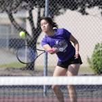 Sequim Gazette photo by Matthew Nash/ Tiffany Lam, Sequims no. 1 singles player, hits the ball on May 2 during her 6-1, 6-1 win against Bremertons Emma Murray. Sequim swept matches that day in their final regular match of the season.