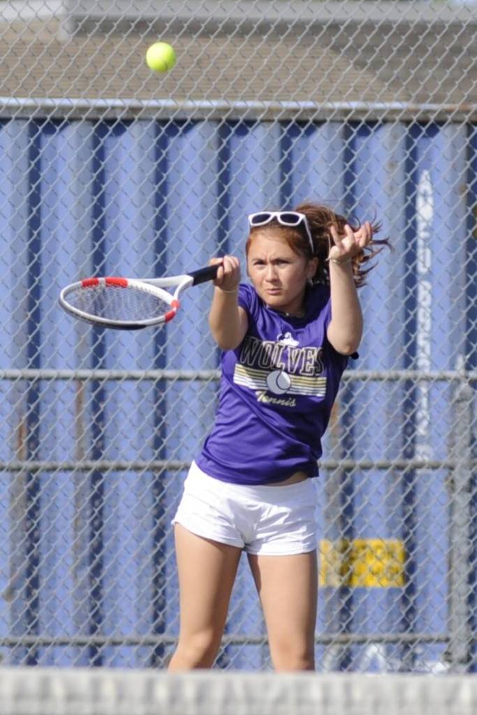Sequim Gazette photo by Matthew Nash/ Sydney Thomas-Harris returns a hit with her doubles partner Kendall Day in Sequims final regular season match of the year. They won 6-3, 6-1 against Bremertons Charlize Cabig and Abby Stenwick.