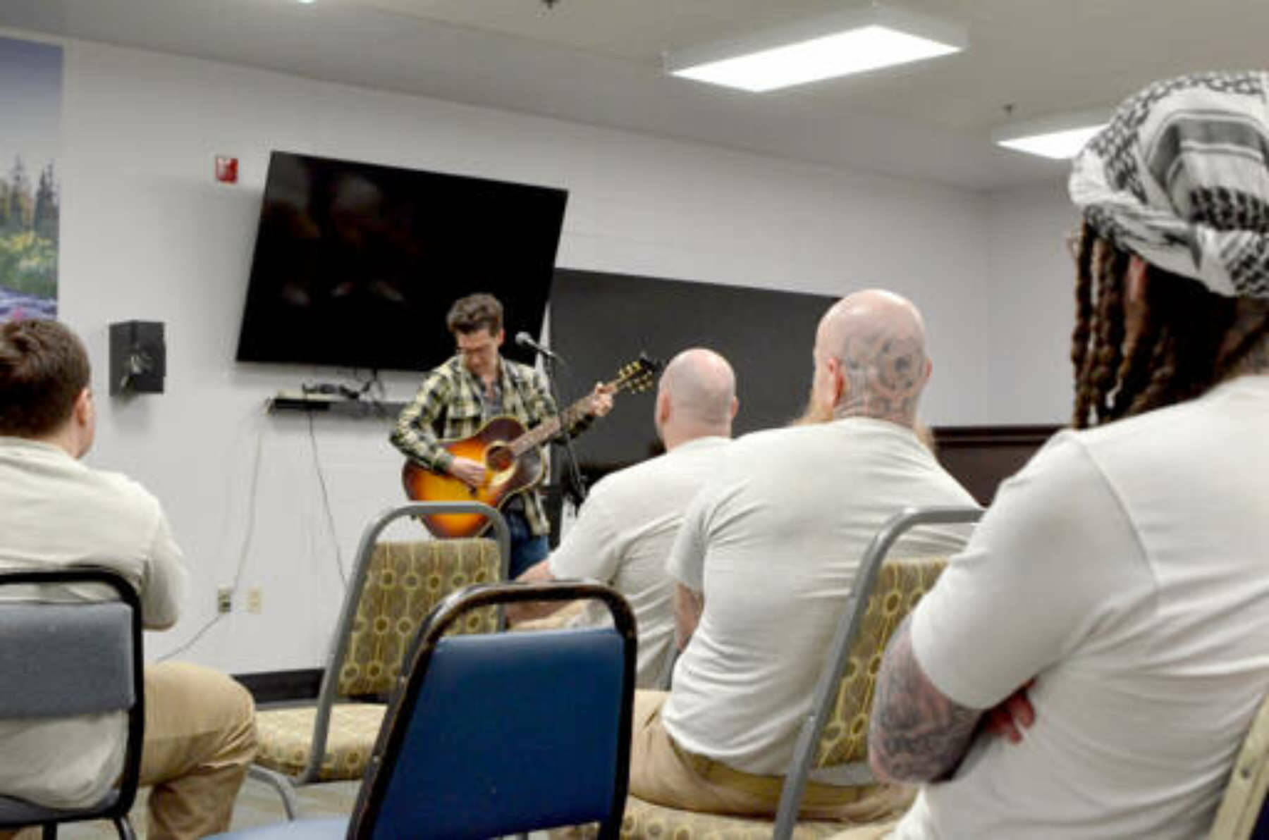 Olympic Peninsula News Group photo by Elijah Sussman
Matt Butler performs for about 70 inmates in the visiting room at Clallam Bay Corrections Center on Thursday, May 1.