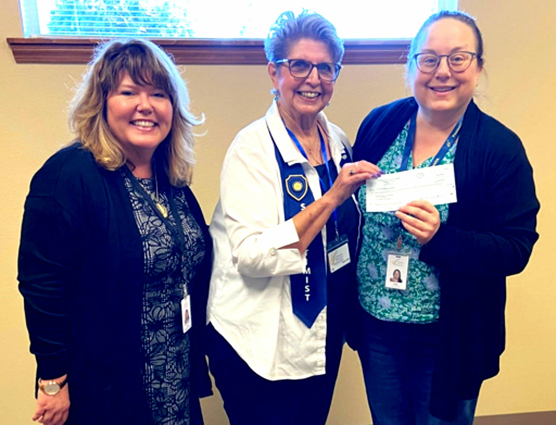 Photo courtesy of Sequim Soroptimists
Linda Klinefelter, center, president of Soroptimist International of Sequim, presents a check for $9,000 to Tracy Sheldon, left, development director for Peninsula Behavioral Health (PBH), and Patty Jordan, PBHs Child Family Services supervisor. The money will be used for child- and youth-friendly treatment rooms at PBHs Sequim location.