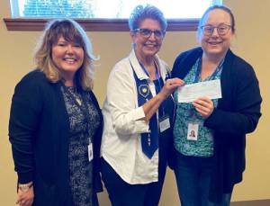 Photo courtesy of Sequim Soroptimists
Linda Klinefelter, center, president of Soroptimist International of Sequim, presents a check for $9,000 to Tracy Sheldon, left, development director for Peninsula Behavioral Health (PBH), and Patty Jordan, PBHs Child Family Services supervisor. The money will be used for child- and youth-friendly treatment rooms at PBHs Sequim location.
