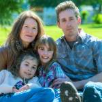 Photo by Emily Matthiessen
The Hanshaw family is struggling under the weight of emotional and financial stressors brought by the recent diagnoses by doctors at Seattle Childrens Hospital that have finally answered the question of why Ember, center, has always been frail. Shown here with Ember are her parents, Jennifer and Tim Hanshaw, and 9-year-old sister Lena, who shares a hereditary condition with her father and sister.