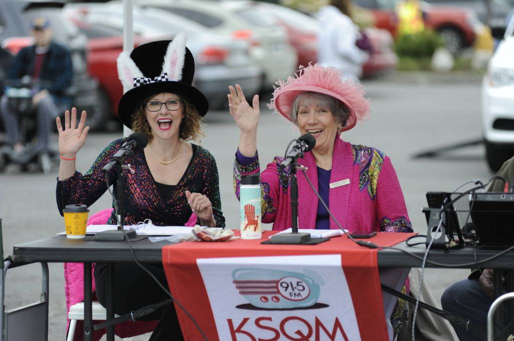 Sequim Gazette photo by Matthew Nash/ Jennifer Pettit and Dorinda Ray with KSQM 91.5 FM announce the latter portion of the parade near Seventh Avenue.