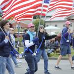 Sequim Gazette photo by Matthew Nash/ Nell Clausen and fellow members of the Sequim Sunshine Rotary and Sequim High School Interact Club promote the Flag Subscription program where they place about 650 U.S. flags on five holidays  Presidents Day, Memorial Day, the Fourth of July, Labor Day and Veterans Day.