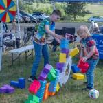 Sequim Gazette photo by Emily Matthiessen
Duncan Burns, 11, and Sylas Plue, 7, work on a giant Tetris puzzle together at the Irrigation Festival Car Show.