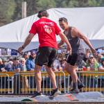 Sequim Gazette photo by Emily Matthiessen
Brian Bartow and Sean Yokoyama compete in the log roll. Yokoyama won first place in the competition, and a number of other competitions at the Logging Show on Saturday.