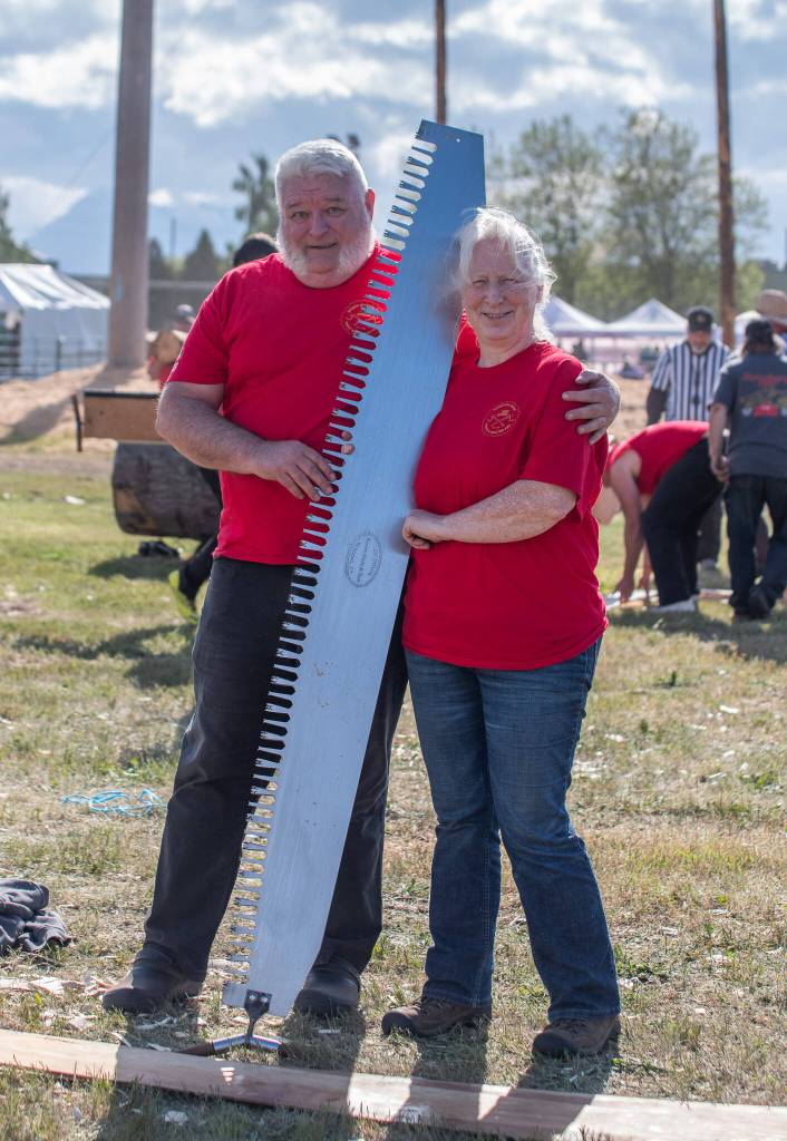Sequim Gazette photo by Emily Matthiessen/ Mike and Martha Nicholas competed in a number of events at Sundays logging show. It was Marthas birthday, and she said she is proud to be 65, and competing with the younger women.