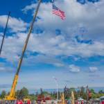 Sequim Gazette photo by Emily Matthiessen/ Contestants in this years Sequim Logging Show wore red shirts which contrasted beautifully with temperate blue skies.