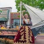Sequim Gazette photo by Emily Matthiessen/ Queen Lily Tjemsland waves at the crowd as this years Irrigation Festival float passes down Washington Street in the parade.