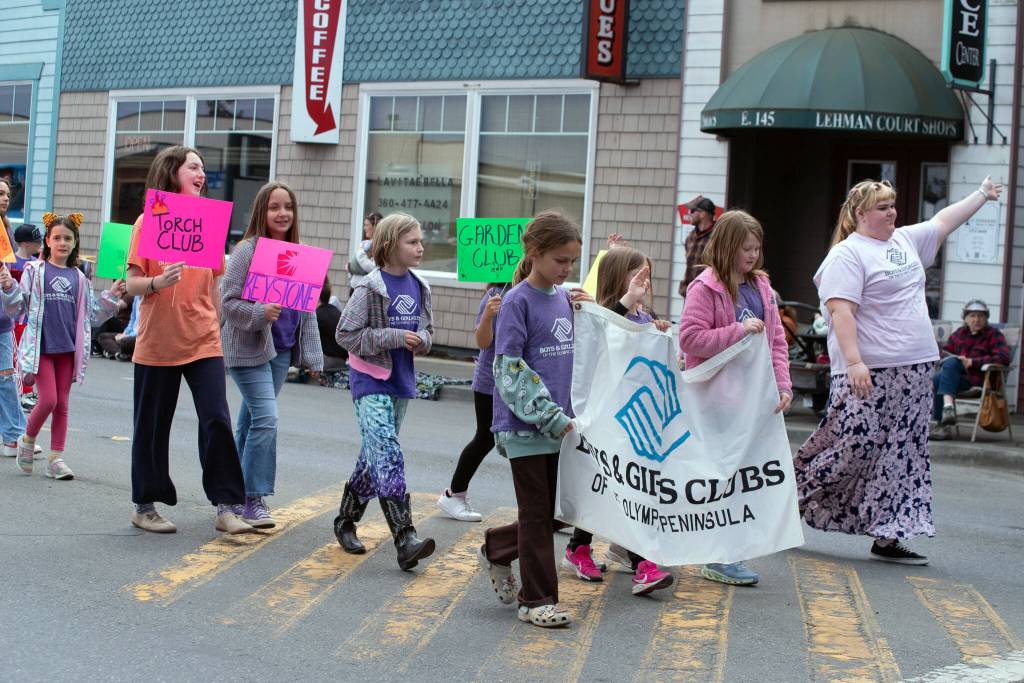 Sequim Gazette photo by Emily Matthiessen/ Members of the Boys and Girls Club march in the Irrigation Festival Parade.