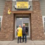 Sequim Gazette photo by Emily Matthiessen
Laura Shaw stands with husband Tom Shaw outside her Donuts, Cakes and More Bakery at 171 W. Washington St. in Sequim. She also owns Pies, Cakes and More in Port Angeles.