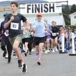 Sequim Gazette photo by Matthew Nash/ Runners and walkers start the Irrigation Festivals Run Series on May 10.