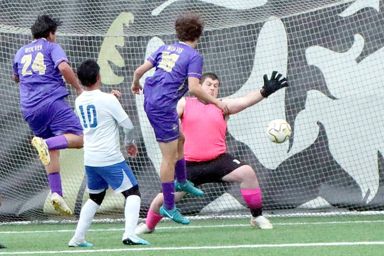 Photo by Dave Logan
Sequims Nico Musso, third from left, scores the second goal the Wolves 2-0 Class 2A West Central District Tournament victory over Bremerton on May 15 at Peninsula Colleges Wally Sigmar Field.