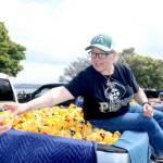 Dave Logan for the Olympic Peninsula News Group/
Port Angeles Mayor Kate Dexter is one of several local people who helped pluck a winning duck from a pickup truck on Sunday at Port Angeles City Pier. There was 36 ducks to be plucked from six Wilder Toyotas.