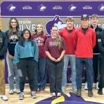 Sequim Gazette photo by Matthew Nash
Sequim High School senior athletes, from left, Nolan Valenzuela, Arianna Stovall, Aspen Goldner, Dawn Hulstedt, Mikki Green, Braydan White, Ethan Staples, Ethan Melnick, and Jayms Vilona all participated in a college commitment event on May 22. The nine students committed to play sports at six different colleges.