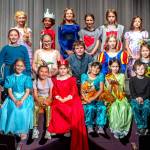 Sequim Gazette photo by Emily Matthiessen
The second-fifth grade cast of The Princess and the Pea poses for a group photo during a recent rehearsal with their Olympic Peninsula Academy teachers Dee Dee Nielsen (left) and Michele Canepa. The students will perform Friday, May 30, at 7 p.m. and Saturday, May 31, at 1:30 p.m., opening for the musical Newsies, Jr. by OPAs older drama students.