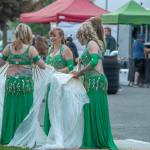 Sequim Gazette photo by Emily Matthiessen
Laura Samperi-Ferdig, Sequims leader of the Peninsulas only belly dance troupe, Shula Azhar, smiles as the troupe prepares for a dance at the Juan de Fuca festival in Port Angeles last Friday.