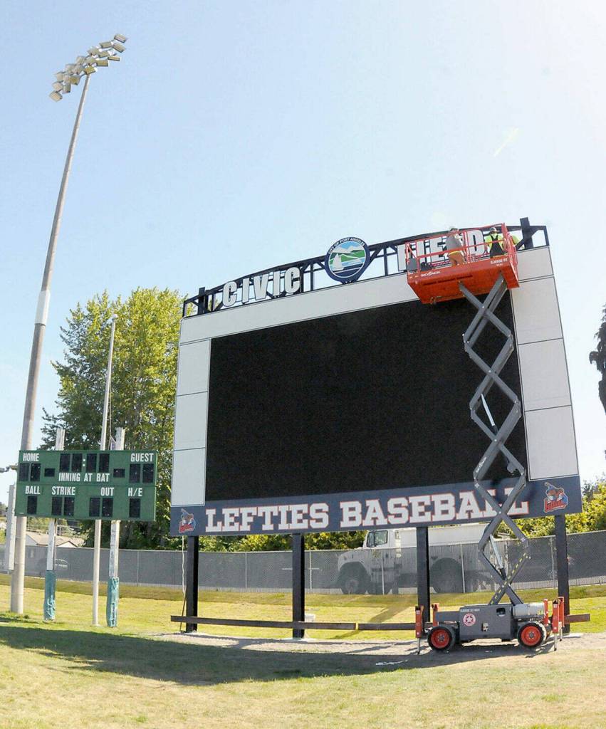 Photo by Keith Thorpe Olympic Peninsula News Group
A crew from Olympic Electric installed a new scoreboard at Port Angeles Civic Field on May 27. The new scoreboard will contain a video board similar to what fans see at T-Mobile Park in Seattle. The Port Angeles Lefties started their 2025 West Coast League wooden bat baseball season on May 30. Theyll play through mid-August. Find information about the teams schedule, tickets and more, at <a href="https://paleftiesbaseball.com" target="_blank">paleftiesbaseball.com</a>.
