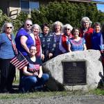 Photo courtesy New Dungeness Chapter DAR/ To celebrate the formation of a new chapter of Daughters of the American Revolution in Sequim, many of the organizing members met for a photo at the New Dungeness historical marker at the corner of Marine Drive and Clark Road. They are, from left: Charlotte Elkins, Darlene Cook, Tammie Cochran, Donna Olson, Krista Johnson, Judy Nordstrom, Pam Grider, Anita Reynolds, Marianne Burton, Carol Medlicott, and Mona Kinder. Those in the front row are Monica Reynolds (left) and Lorri Gilchrist.