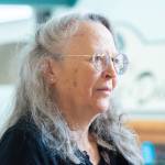 Photo by Emily Matthiessen
Caroline Fraser, Peninsula Colleges 2025 writer-in-residence, listens to a fan of her Pulitzer Prize winning Prairie Fires: the American Dreams of Laura Ingalls Wilder, talk about her own familys ancestral experience living in prairie land decimated by agricultural practices that were unsuitable to the flora and fauna of the region.