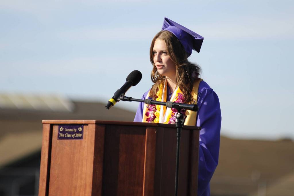 Sequim Gazette photo by Matthew Nash/ Valedictorian Libby Turella reflects on her time high-fiving past graduates at the Grad Walk, her successes with the high school basketball and soccer teams, and saying shes been anticipating graduation day her whole life. Im both anxious and excited for the opportunity to reinvent myself, to expand my interests, and to leave the familiarity of home, she said.