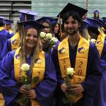Sequim Gazette photo by Matthew Nash/ Mariah Stringer and Aeidon Crear line up with fellow graduates in the Sequim Middle School gymnasium as they await the walk to their graduation ceremony.