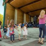 Sequim Gazette photo by Emily Matthiessen/
At the James Center for the Performing Arts band shell in Carrie Blake Community Park on Sunday afternoon, the Sequim City Band combined forces with dancers from Sequim Ballroom Dance, guest musicians, singer Sarah Shea, Olympic Theatre Arts David Herbelin and an enthusiastic audience of people and dogs who braved the heat to enjoy an outdoor concert.