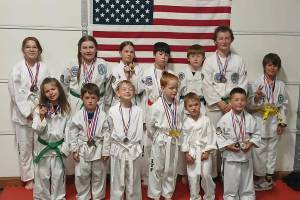 Photo courtesy of Larry Muckley/ Students at Next Level Taekwondo in Sequim recently brought home hardware from the Pacific Northwest USTF Championship, which took place in La Center, Washington.