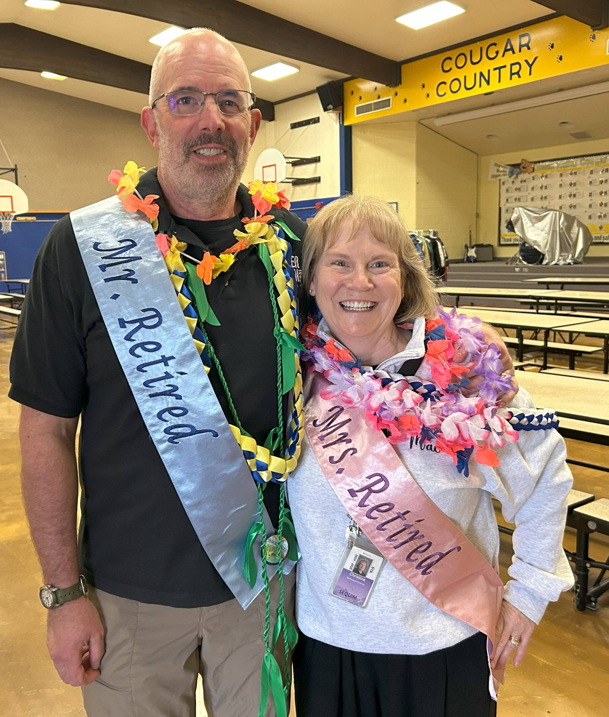 Sequim Gazette photo by Matthew Nash
Eric Danielson and Christine MacDougall Danielson stand together before the fifth grade Moving On ceremony at Helen Haller Elementary on June 12. It was also their last day before retirement. Eric retired as a fifth grade teacher and Christine as a reading specialist at the elementary school.