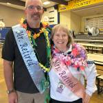 Sequim Gazette photo by Matthew Nash
Eric Danielson and Christine MacDougall Danielson stand together before the fifth grade Moving On ceremony at Helen Haller Elementary on June 12. It was also their last day before retirement. Eric retired as a fifth grade teacher and Christine as a reading specialist at the elementary school.