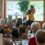 Sequim Gazette photo by Emily Matthiessen/ Vernon was voted Best Young Elvis by the King of Rock and Rolls friends and stage entourage. During the performance at The Lodge at Sherwood Village, he wore a black and gold ensemble while performing songs from the early years of Elvis career.